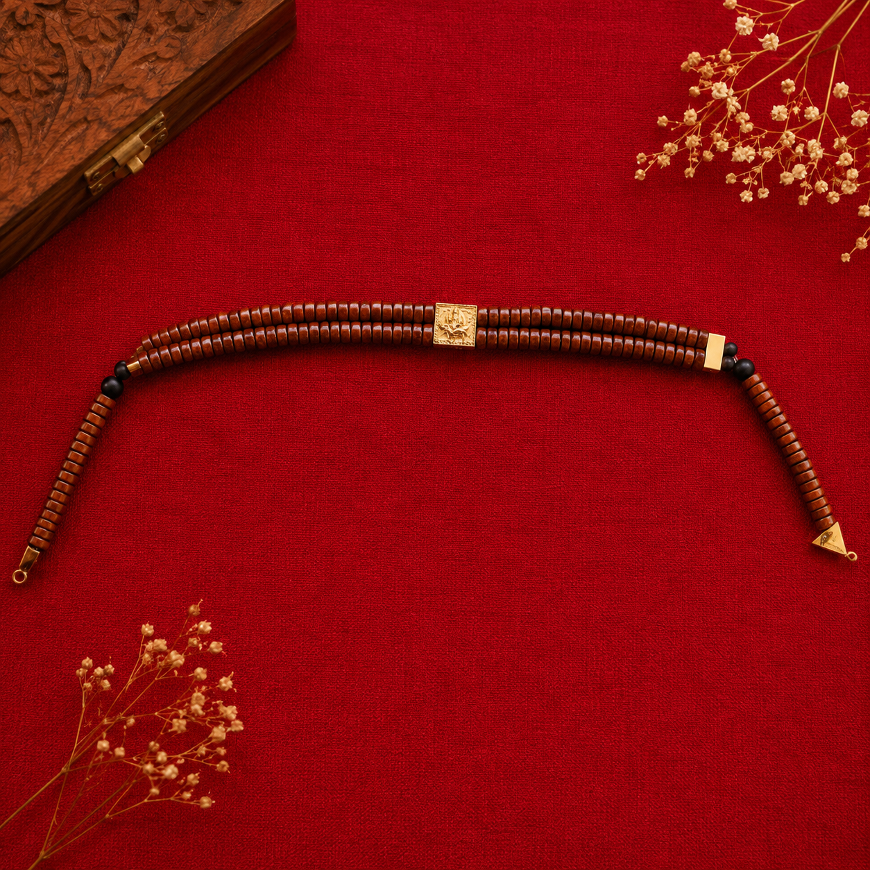 Karungali Double-Layer Bracelet with Gold-Plated Ganapathi Centerpiece