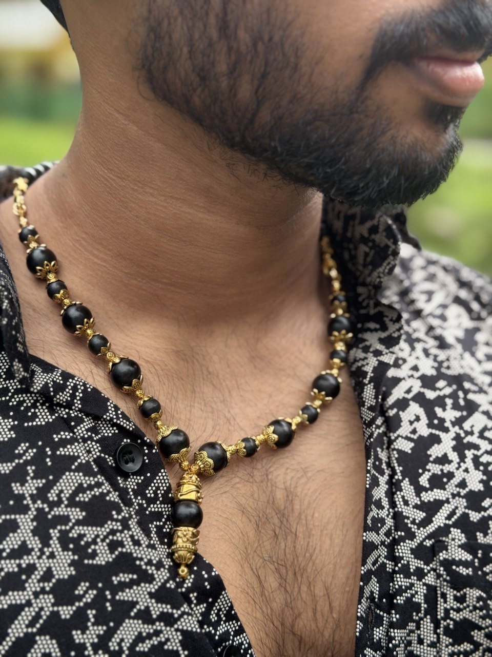 Karungali Bead Pendant Necklace with Golden color Accents