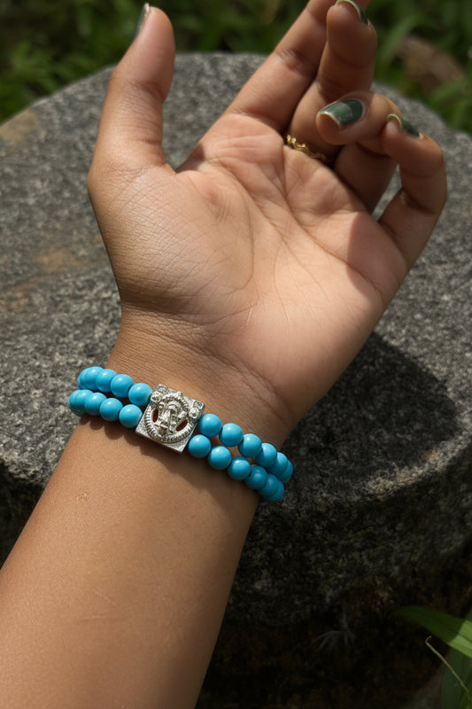 Blue Bead Bracelet with Silver Buddha Charm
